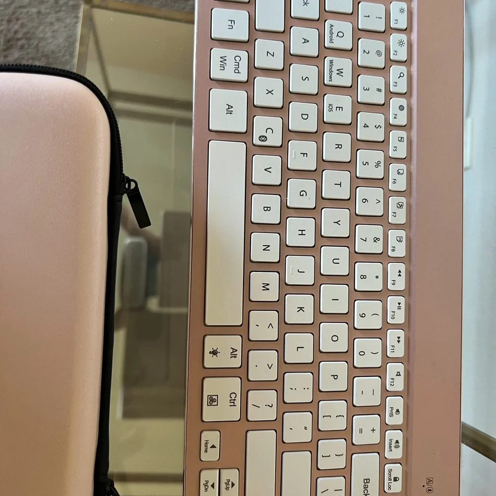 Set of Pink IPad Accessories, keyboard, case, and cord case-3 items